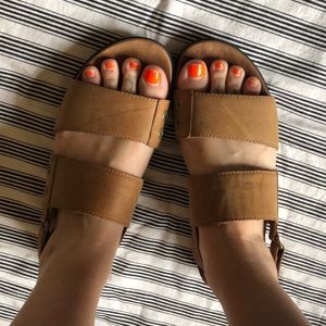 Sore sandals in brown leather